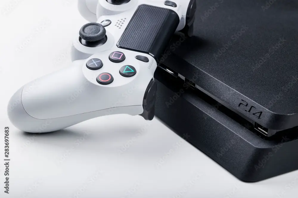 PlayStation4 console with a white controller
